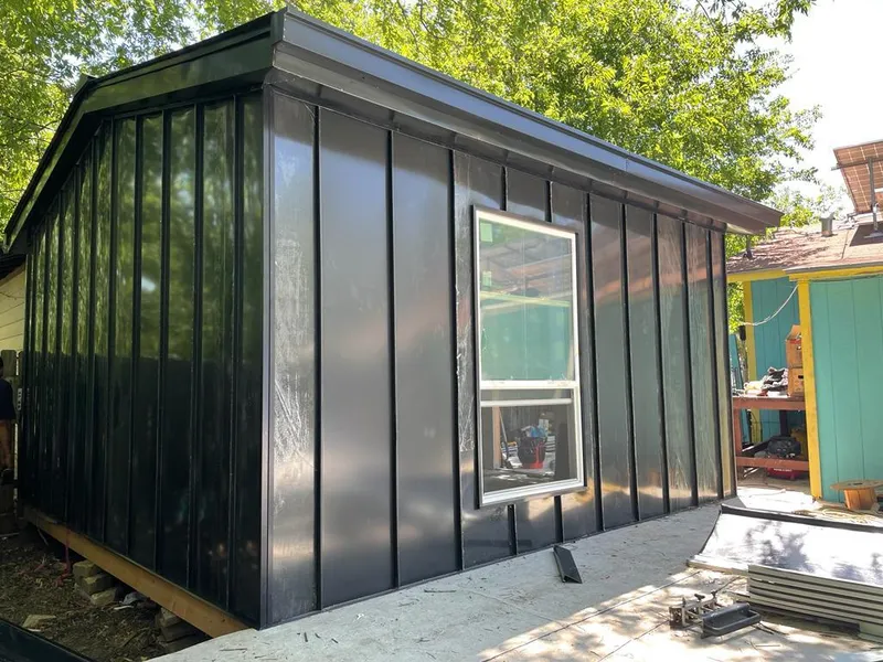 Black standing seam metal wall panels for Metal Roof Installation in Cheektowaga